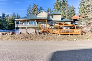 Enjoy a serene forest view from the upper balcony of this lodge, surrounded by natural beauty.