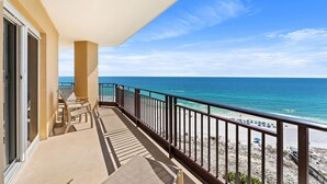 A balcony with a view of the beach and ocean. - Wraparound Balcony ~ Condo Remodel Jan-Feb 2026 (Miramar Beach)