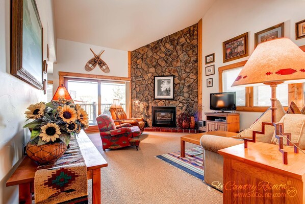 Flat-screen TV, fireplace