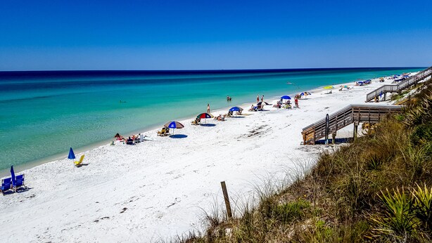 A beach with white sand, clear turquoise water, and a wooden walkway leading to the shore. - Close to Beach & Seaside, Vintage Cottage + Free Attraction Tickets! (Santa Rosa Beach)