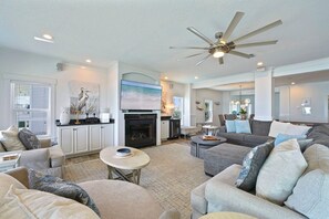 Flat-screen TV, fireplace, video-game console, Netflix