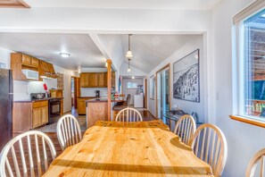 Enjoy meals in this well-appointed dining area with a large table and six chairs.