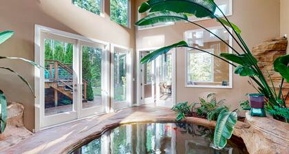 Luxurious tropical home with private hot tub atrium, theater & pond
