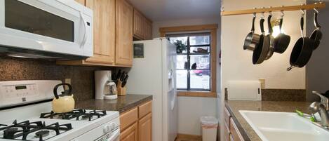 Nicely up dated kitchen with gas range, granite counters