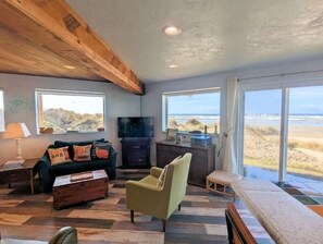 Smart TV, fireplace, DVD player, books