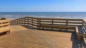 A wooden boardwalk leading to a beach with a clear view of the ocean. - Island Breeze Home, Dual Pools & Private Decks (Port Aransas)