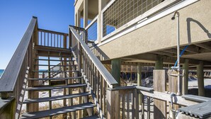 A wooden staircase leading to a building with a balcony overlooking a beach. - Gulf Front, Gorgeous Panoramic Gulf Views, Large Deck, Dune Allen Beach (Santa Rosa Beach)