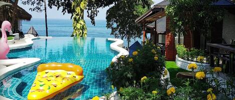 Outdoor pool, a natural pool, pool loungers