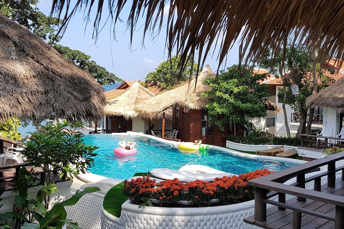 Family Deluxe Bungalow With Sea View | Outdoor pool | Outdoor pool, a natural pool, sun loungers