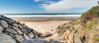 Unique and spacious home with private hot tub, game room, and great ocean views