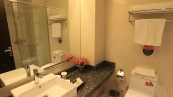 Shower, free toiletries, hair dryer, slippers