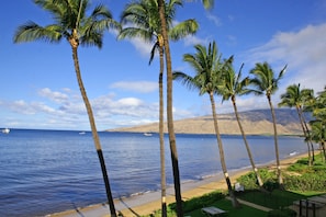On the beach, sun-loungers, beach towels