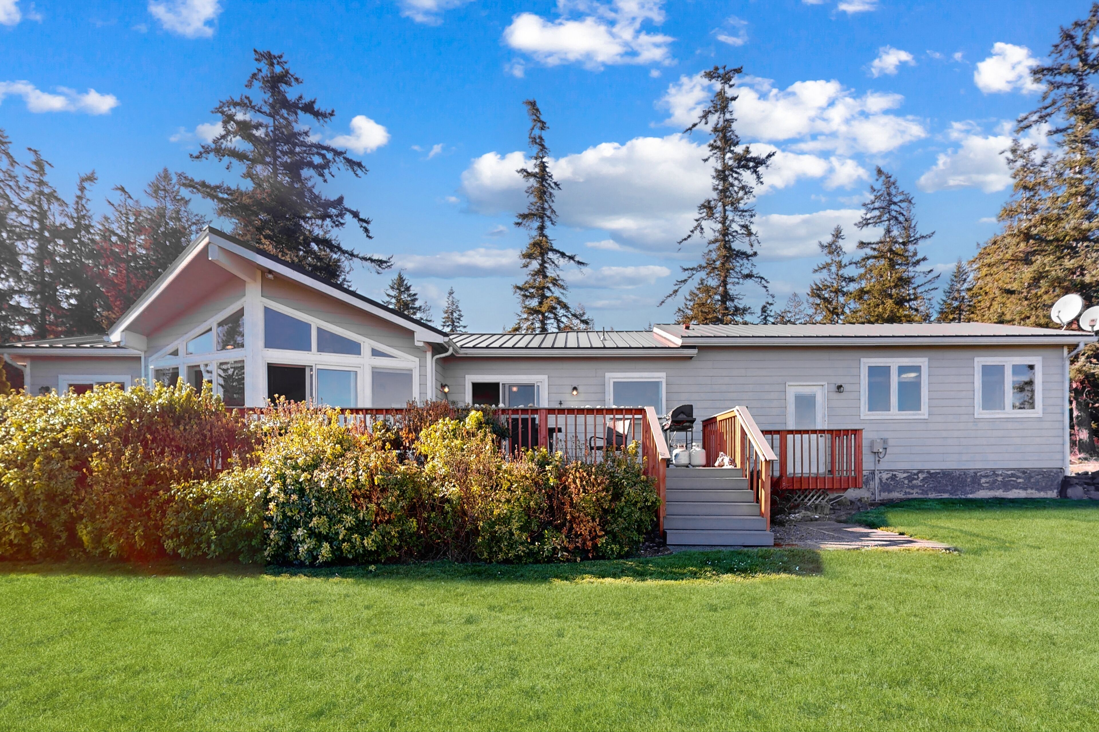 Lovely, oceanfront home with multiple sea views and beach access