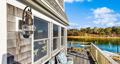 Breathtaking Riverfront Home with a Lovely Deck, Close to Beach - Dogs OK