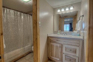 Bathtub, hair dryer, towels