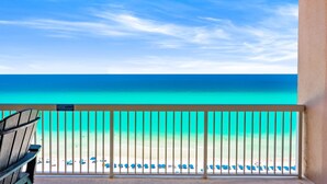 A balcony with a view of a beach and ocean. - AMAZING VIEWS! FREE BEACH SERVICE! (Panama City Beach)