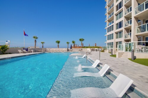 WALK OUT TO POOL FROM FURNISHED PATIO!  Beachside Condo, Just Steps to Beach!