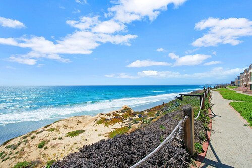 Stairs down to the beach, tennis court, gym, spa, and pool!- Ocean Front Gem