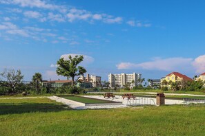 Outdoor dining - Casa Marina 2B/2B Vacation Condo On Canal!  Walk to Beach! Greetings From Sunny Florida! (Fort Myers Beach)
