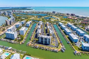 Exterior - Casa Marina 2B/2B Vacation Condo On Canal!  Walk to Beach! Greetings From Sunny Florida! (Fort Myers Beach)