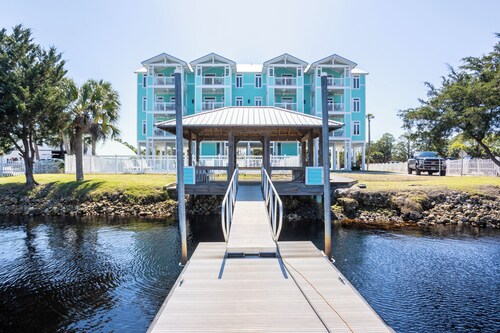 WATERFRONT, RIVERS EDGE CONDO #2C-BLDG 1* PRIVATE DOCK and ASSIGNED BOAT SLIP!