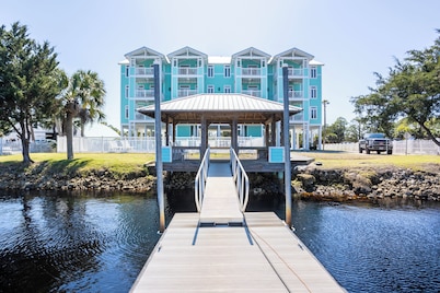 WATERFRONT, RIVERS EDGE CONDO #2C-BLDG 1* PRIVATE DOCK and ASSIGNED BOAT SLIP!