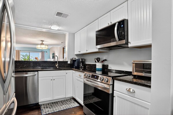Fridge, microwave, oven, stovetop
