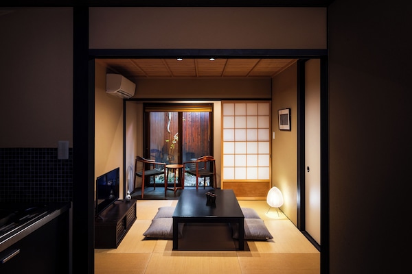 Japanese Town Style House | Living area | Flat-screen TV