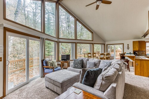 Expansive Wooded Home with a Brook, Firepit, Private Hot Tub and Shared Pool