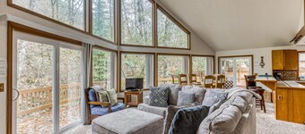 Expansive Wooded Home with a Brook, Firepit, Private Hot Tub and Shared Pool