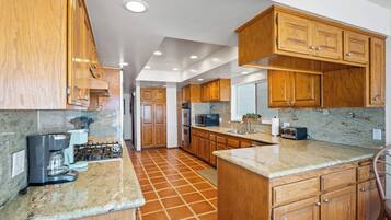 Fridge, microwave, dishwasher, coffee/tea maker