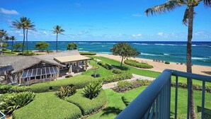 A resort with a beach view, a pool area, and well-maintained gardens.