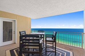 Outdoor dining - BEACHFRONT UNIT!! COMFORTABLY SLEEPS 8! UPDATED JUNE 2026!! (Panama City Beach)