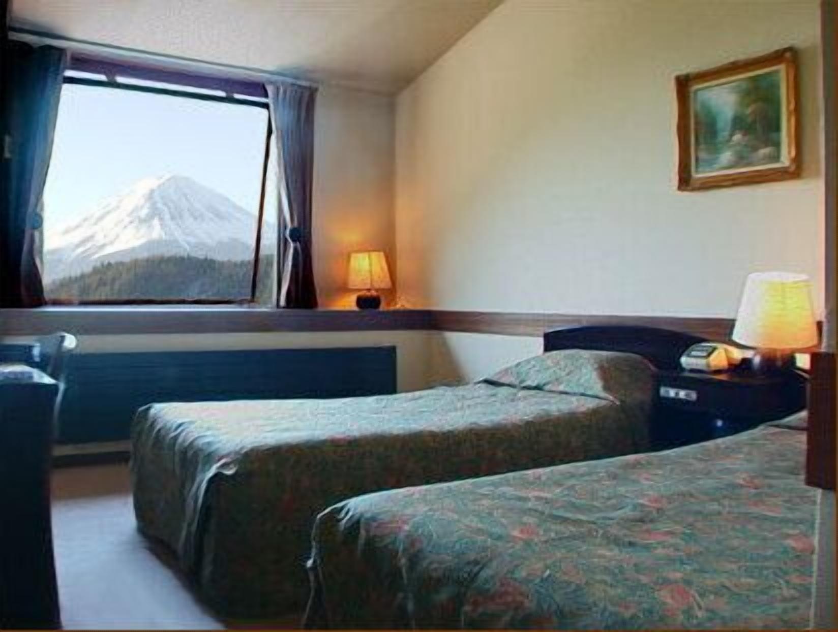 Desk, laptop workspace, iron/ironing board, rollaway beds