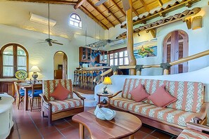 Flat-screen TV, DVD player, books