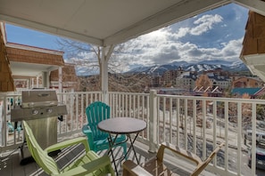 Enjoy al fresco dining or relaxation with a mountain view from this outdoor space.