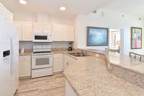 Enjoy cooking with an oven, microwave, and sink, and take in the ocean view from the window.