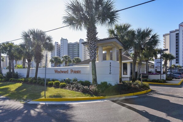 A building with a sign reading "Windward Pointe" and the number "2470".
