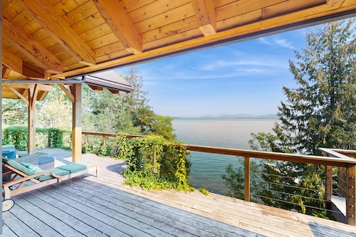 Beautiful lakefront lodge w/ views, private beach access, & large deck