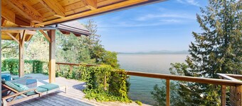 Beautiful lakefront lodge w/ views, private beach access, & large deck