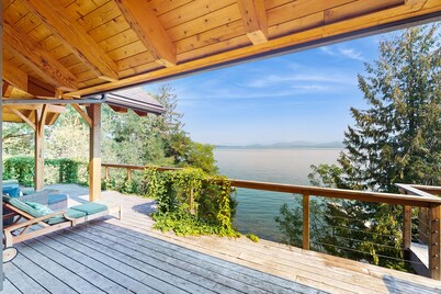 Beautiful lakefront lodge w/ views, private beach access, & large deck