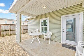 Outdoor dining - Updated Coastal Duplex | Heated Pool & Walk to the Beach (Corpus Christi)
