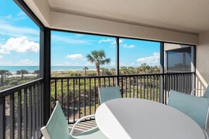 Outdoor dining - Sanddollar #A201 is a 2/2 Beach Front Vacation Rental on Sanibel Island (Sanibel Island)