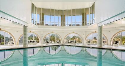 Oceanfront retreat with luxury pools, hot tub, lazy river, game room & balcony