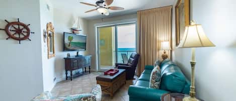 Flat-screen TV, books, stereo