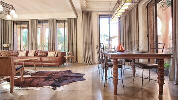 Family Villa, 4 Bedrooms | Living area | Flat-screen TV, fireplace