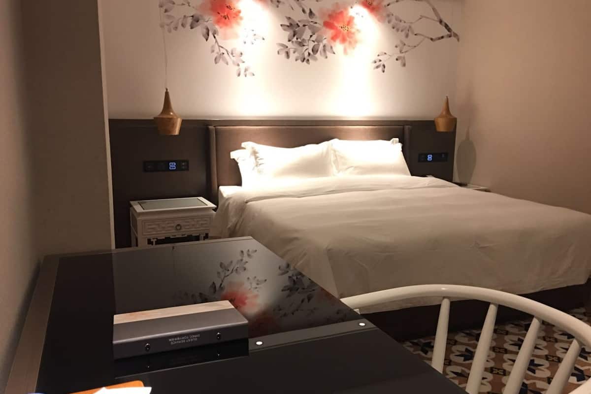 Habitación doble superior | Ropa de cama de alta calidad y minibar