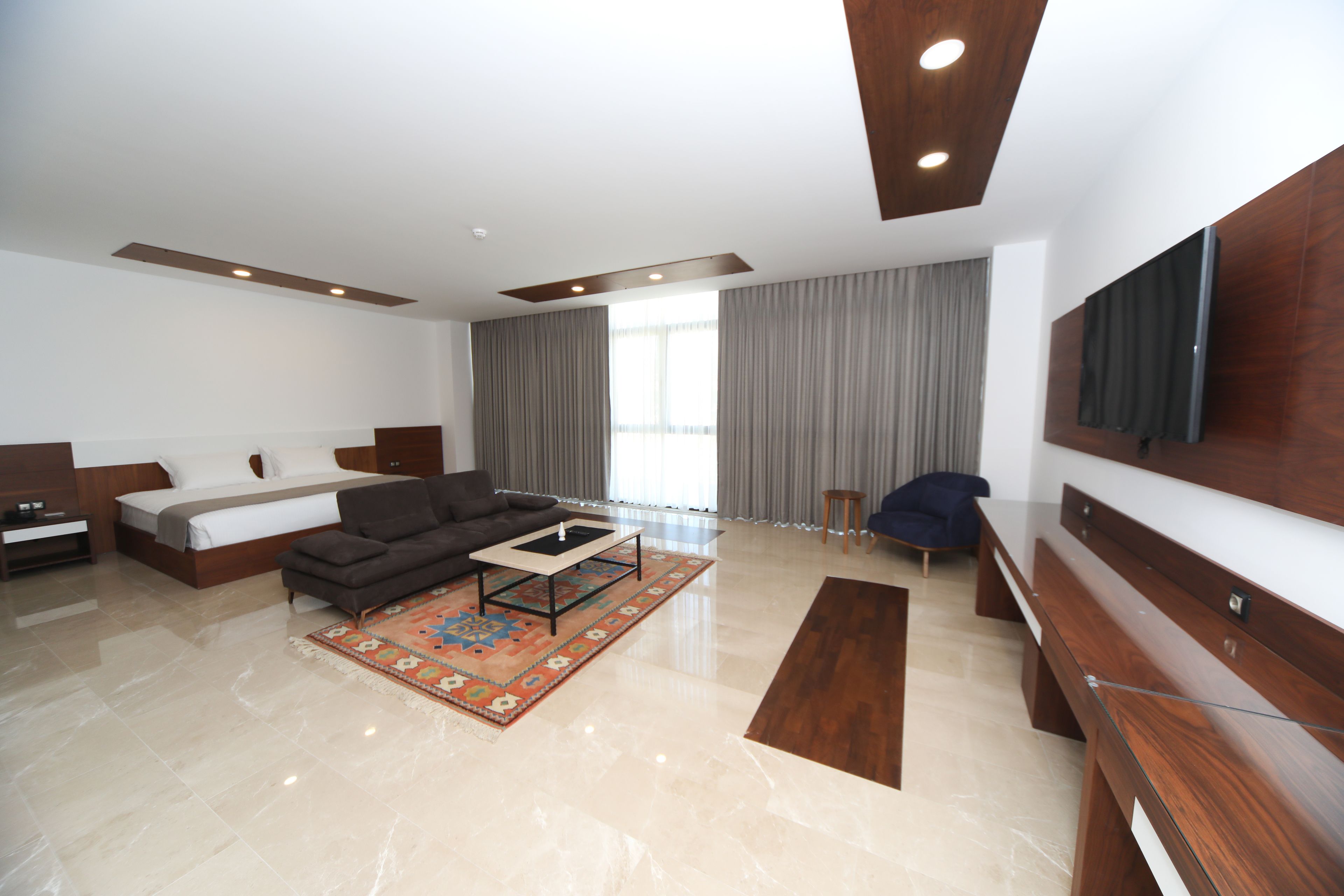 deluxe suite | living area | lcd tv
