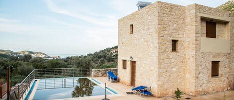 Outdoor pool, pool umbrellas, pool loungers