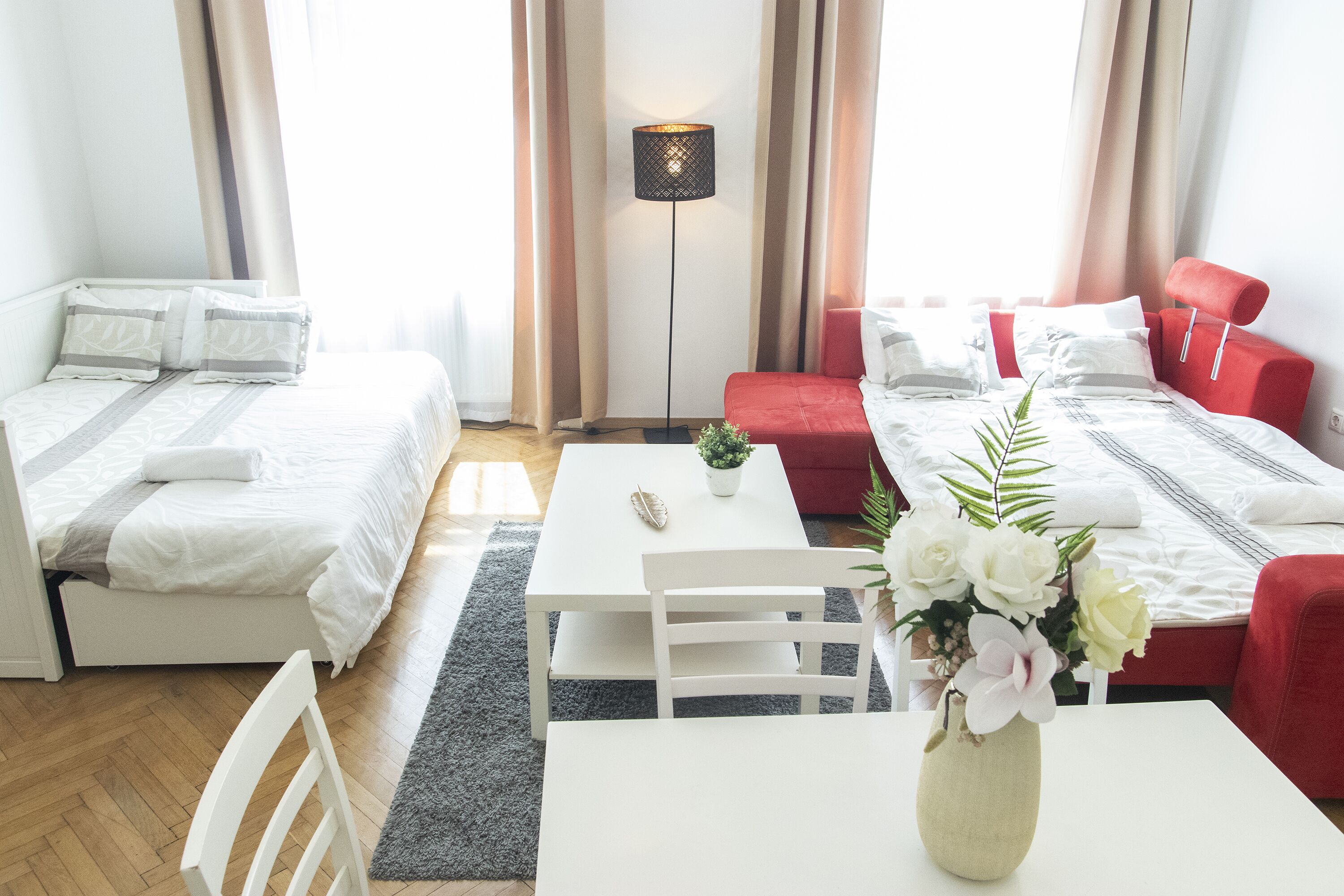 Deluxe Apartment | Living area | TV